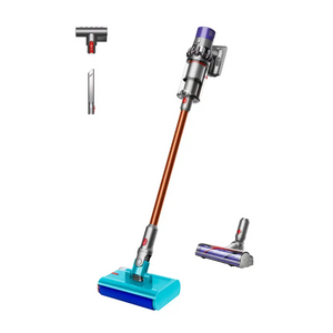 Dyson Cyclone V10 Submarine cordless stick vacuum cleaner in nickel and copper with copper tube, turquoise and blue wet-dry floor head, detachable motorized brush head, and included crevice tool attachment displayed against white background