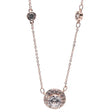 Rose gold circular diamond pendant necklace with round cut center stone and halo setting on delicate chain with accent diamonds
