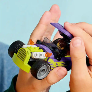 Child's hand holding a LEGO Hot Rod 60485 set featuring a neon yellow and purple race car with black wheels and orange flame details against a blue sky background
