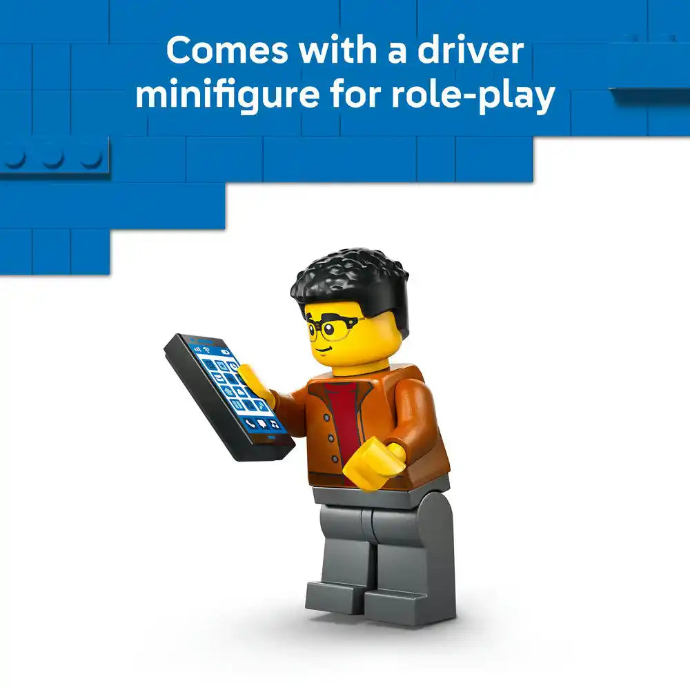 LEGO minifigure with black hair and glasses wearing a brown jacket and red shirt holding a blue smartphone, accompanied by text stating "Comes with a driver minifigure for role-play" against a blue LEGO brick background