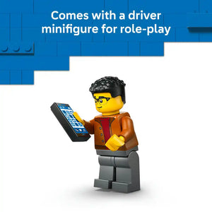 LEGO minifigure with black hair and glasses wearing a brown jacket and red shirt holding a blue smartphone, accompanied by text stating "Comes with a driver minifigure for role-play" against a blue LEGO brick background