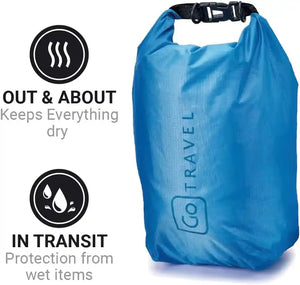 Blue waterproof dry bag by Go Travel with black shoulder strap and toggle closure, featuring product icons showing protection for wet and dry items during transit