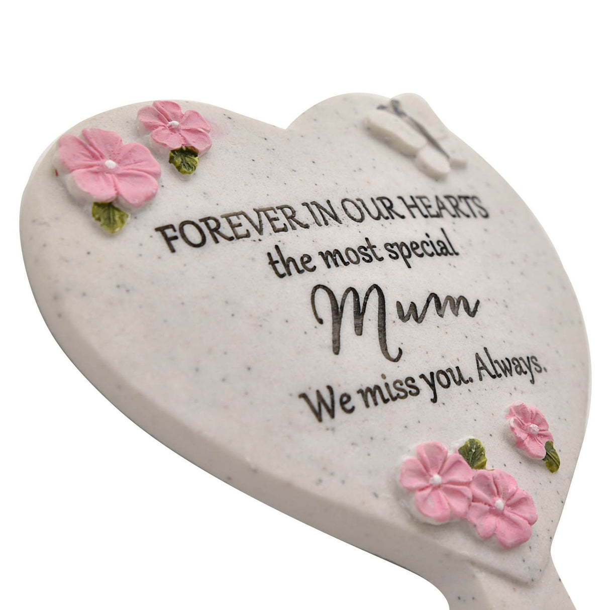 Heart-shaped plaque with floral decorations and text on a white background