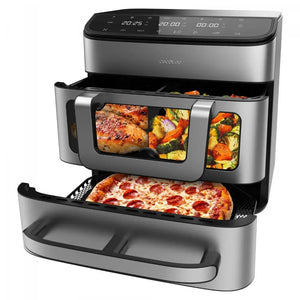 Cecotec Cecofry FoodCourt 18 litre stainless steel air fryer oven with digital display showing cooked pizza in bottom drawer, rotisserie basket with chicken and roasted vegetables in middle section, and upper cooking chamber with food visible through windows