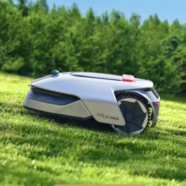 Robotic lawn mower on a grassy field with trees in the background