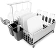 Blackmoor Deluxe Dish Drainer in black and stainless steel featuring hanging wine glasses, compartments for plates and bowls, utensil holder with forks and spoons, and draining trays on a white background