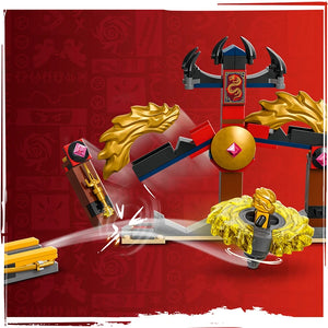 LEGO Ninjago Dragon Spinjitzu Battle Pack 71826 featuring golden dragon-themed building pieces, red and blue ninja weapon accessories, and decorative Asian-inspired architecture elements against a red background