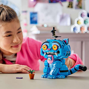 LEGO KPop Demon Hunters Derpy Tiger and Sussie Bird 72537 - a child playing with the finished build. 825 pieces. Ages 9+.