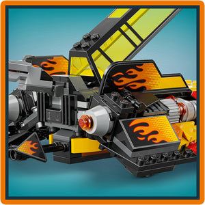 LEGO The Force Burner Snowspeeder 75414 set featuring black and yellow brick pieces with orange flame designs, gray engine components, red accents, and detailed construction elements on turquoise background