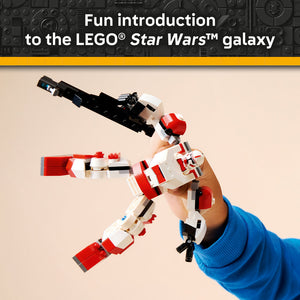 Hand holding a red and white LEGO Clone Shock Trooper Mech with black weapon against beige background, showcasing buildable Star Wars figure with articulated limbs and detailed brick construction
