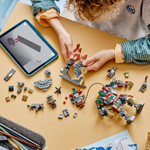 LEGO Star Wars™ Hutt Palace Sentry Droid Showdown 75451 - a child building the set. 415 pieces. Ages 9+.