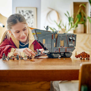 LEGO Star Wars™ Offworld Sandcrawler™ and Mudhorn 75453 - a child playing with the finished build. 1683 pieces. Ages 14+.