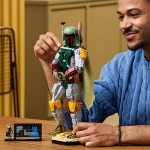 LEGO Star Wars™ Boba Fett™ 75455 - a child playing with the finished build. 1544 pieces. Ages 18+.