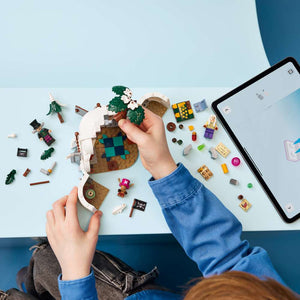 LEGO ONE PIECE Dr. Hiriluk's Hideout 75641 - a child building the set. 271 pieces. Ages 9+.