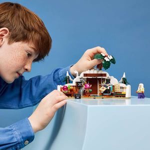 LEGO ONE PIECE Dr. Hiriluk's Hideout 75641 - a child playing with the finished build. 271 pieces. Ages 9+.