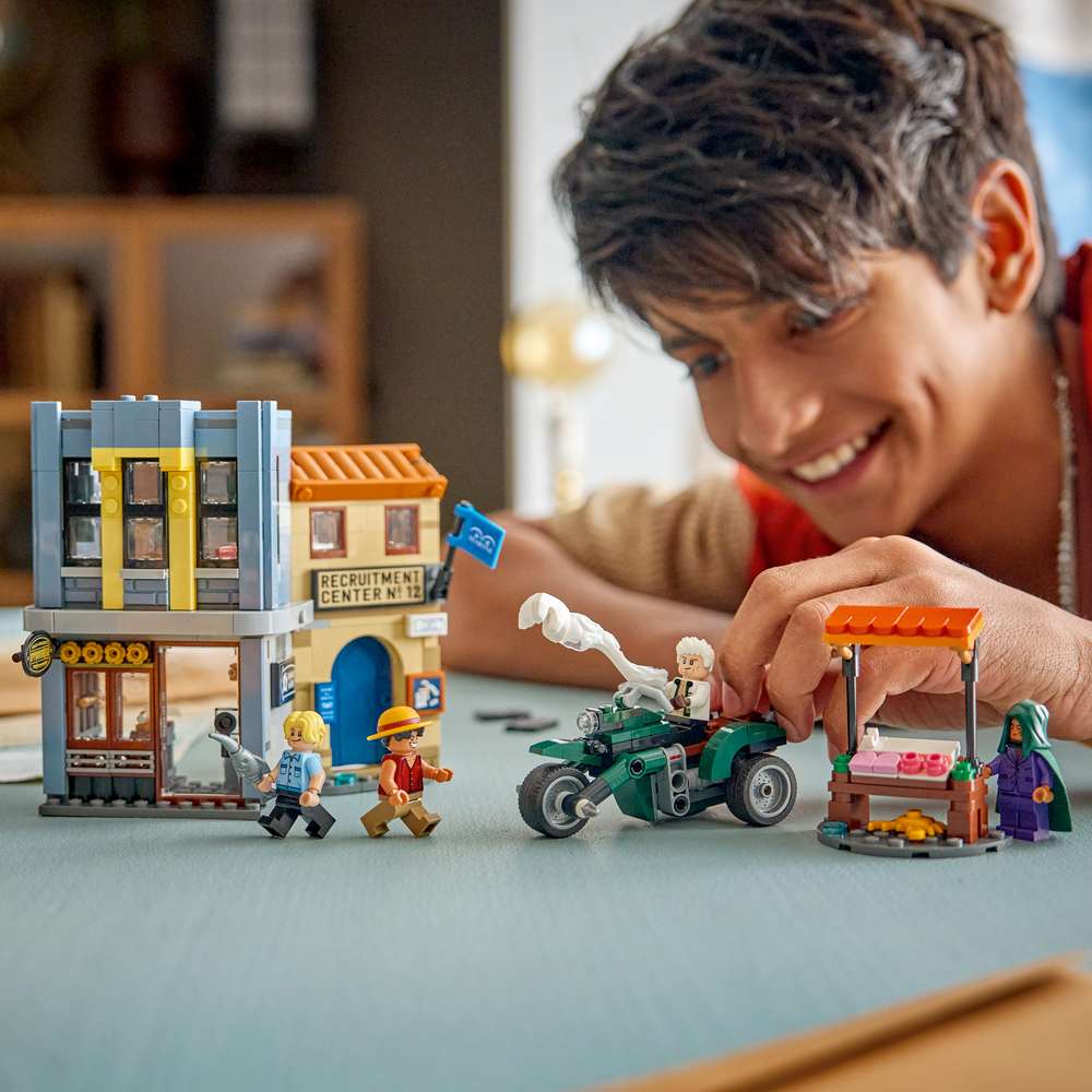 LEGO ONE PIECE Showdown with Captain Smoker 75642 - a child playing with the finished build. 547 pieces. Ages 9+.