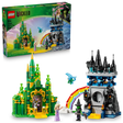 LEGO Wicked 75689 set featuring green Emerald City castle with gold accents and black Kiamo Ko Castle connected by rainbow bridge, includes minifigures and blue dragon, 800 pieces, age 9+