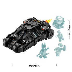 LEGO Batman Tumbler black armored vehicle with flame details measuring 17cm wide and 6cm tall, displayed with transparent minifigure silhouettes of Batman, Two-Face, and Joker, plus a searchlight accessory against white background