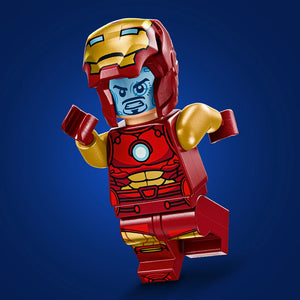 LEGO Iron Man minifigure with red and gold armor, blue face, and gold gauntlets posed against a blue background