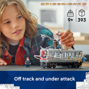 Child playing with LEGO Spider-Man 2 subway train set featuring grey and silver train car with minifigures, web elements and Doc Ock mechanical arms, set age 9+, 393 pieces