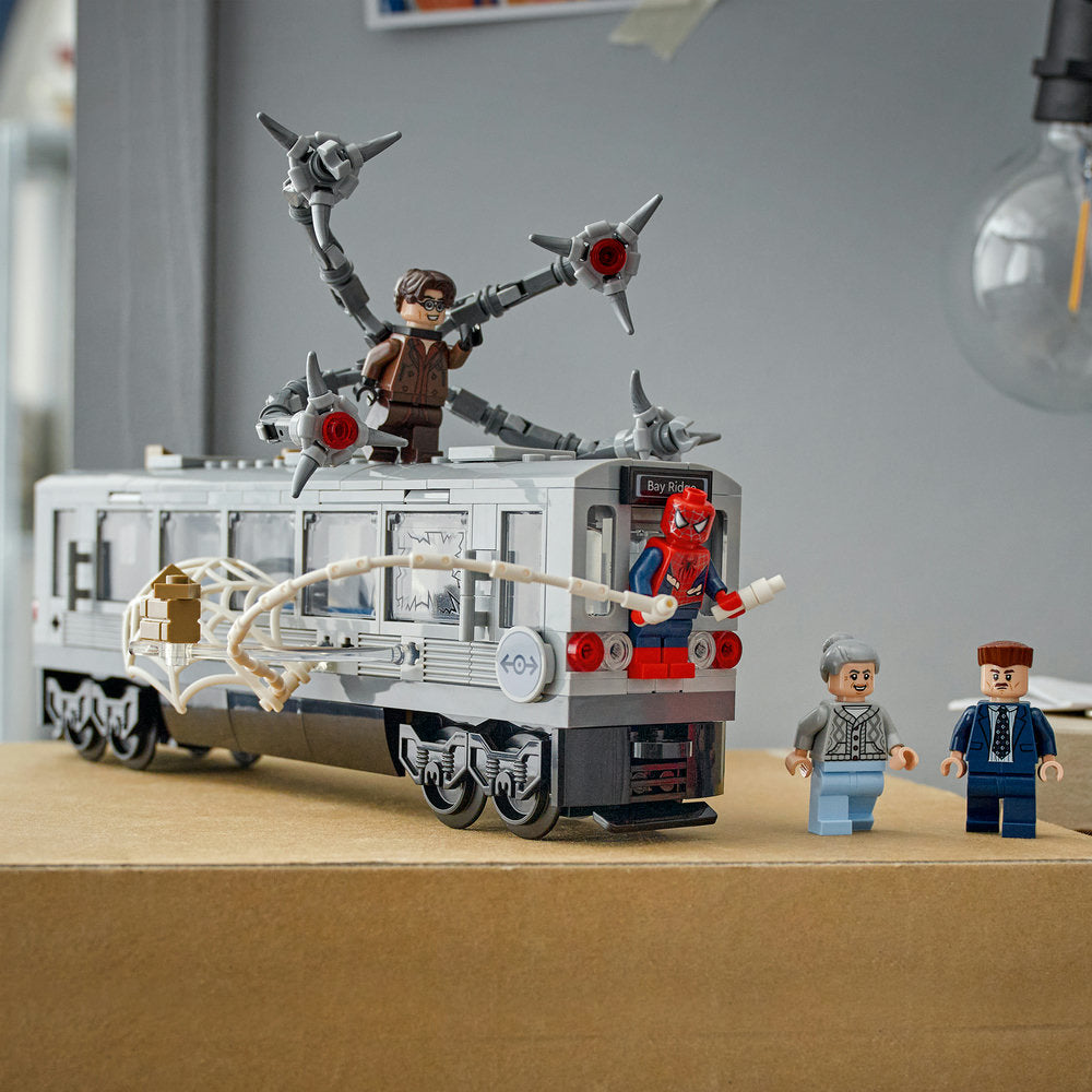LEGO Marvel Spider-Man vs Doc Ock Subway Train set 76321 featuring minifigure pilot with four mechanical arms mounted on white and grey subway train car, Spider-Man red minifigure, two adult minifigures, and detailed brick construction elements displayed on tan surface
