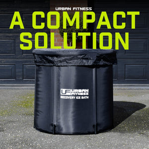Urban Fitness Recovery Ice Bath black collapsible tub 80cm x 75cm displayed outdoors against dark wooden garage doors with neon yellow text overlay reading A Compact Solution