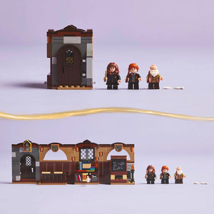 LEGO Hogwarts Castle Charms Class set 76442 showing brown brick tower structure and tan common room interior with three minifigures in black robes with gold accents, including a bearded wizard figure, displayed against purple background with gold dividing line