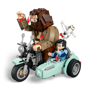 LEGO Hagrid and Harry's Motorcycle Ride set 76443 featuring a brown brick-built Hagrid minifigure with red accents riding a mint green sidecar motorcycle with chrome details, accompanied by a small Harry Potter minifigure in blue robes, constructed entirely from colorful interlocking plastic bricks