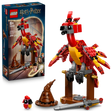 LEGO Harry Potter Fawkes Dumbledore's Phoenix set 76448 featuring red and yellow brick-built phoenix perched on brown wooden stand with sorting hat and wand accessories, 299 pieces, ages 8 plus