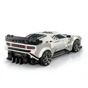 LEGO Bugatti Centodieci Hyper Sports Car set 77240 in white and black with detailed brick construction showing side profile with open door, large rear exhaust pipes, silver wheels and racing stripe details