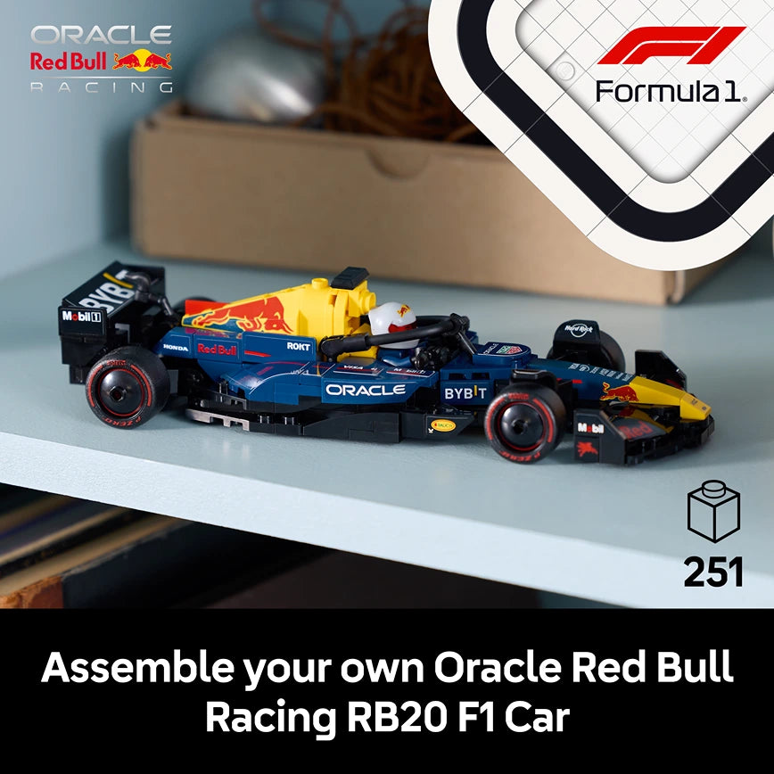 Assembled LEGO Oracle Red Bull Racing RB20 F1 car model in dark blue, yellow and red colors displayed on white surface with instruction box and Formula 1 logo, 251 pieces