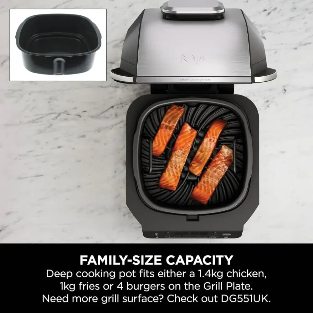Ninja 5 in 1 Grill and Air Fryer EG351UK with stainless steel and black finish, showing open grill basket with salmon fillets cooking, removable deep black cooking pot displayed in inset, family-size capacity on marble countertop