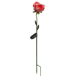 Solar powered garden stake light featuring a red rose flower with green stem, black solar panel and metal ground stake on white background