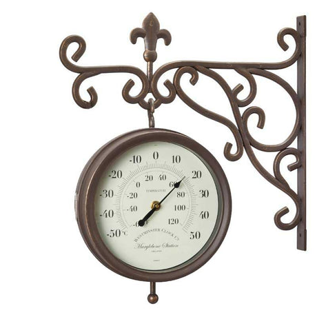 Vintage-style bronze cast iron wall-mounted clock and thermometer with ornate scrollwork bracket, cream dial face showing temperature scale from -50 to 120 degrees and clock numerals, Marylebone Station branding, 8 inch diameter