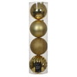 Set of gold Christmas ornaments in a clear cylindrical packaging on a white background