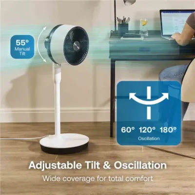 Dimplex Duocool graphite pedestal fan with adjustable tilt and oscillation features, displaying 55 degrees manual tilt and 60-120-180 degree oscillation settings, shown in home office setting with smart control capabilities