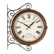 Vintage-style Westminster Clock with ornate scrolled metal bracket, 15-inch brown wooden frame, cream face with Roman numerals, black hands, and integrated thermometer dial, mounted wall clock in traditional station design
