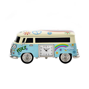Colorful van-shaped clock with peace signs and rainbow designs on a white background