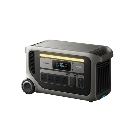 Anker Solix F3000 portable power station 3000Wh with gray and black casing, digital display showing 100W output, four AC outlets, USB ports, and wheeled design for mobility