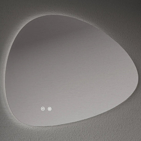 Aqualla Pebble LED bathroom mirror with organic rounded shape, 800x555mm, featuring integrated LED lighting around the perimeter and touch control icons, mounted on textured grey wall