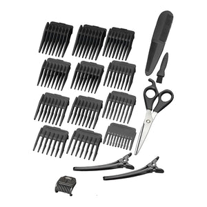 BaByliss men's grooming kit with hair trimmer, scissors, and attachments on a white background