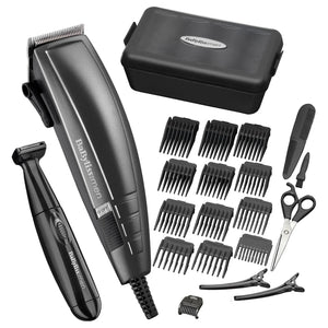 BaByliss men's grooming kit with hair trimmer, scissors, and attachments on a white background