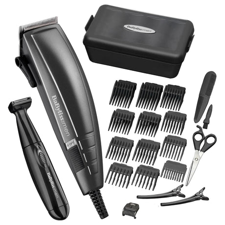 BaByliss men's grooming kit with hair trimmer, scissors, and attachments on a white background