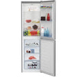 Beko CSG4582S silver 50/50 combi fridge freezer with open doors displaying fresh produce, beverages, frozen fish and meat across multiple shelves and drawers