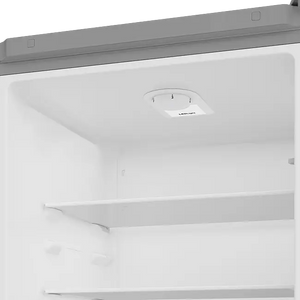 Interior view of Beko 50/50 combi fridge freezer showing white refrigerator compartment with adjustable shelving and temperature control dial on ceiling