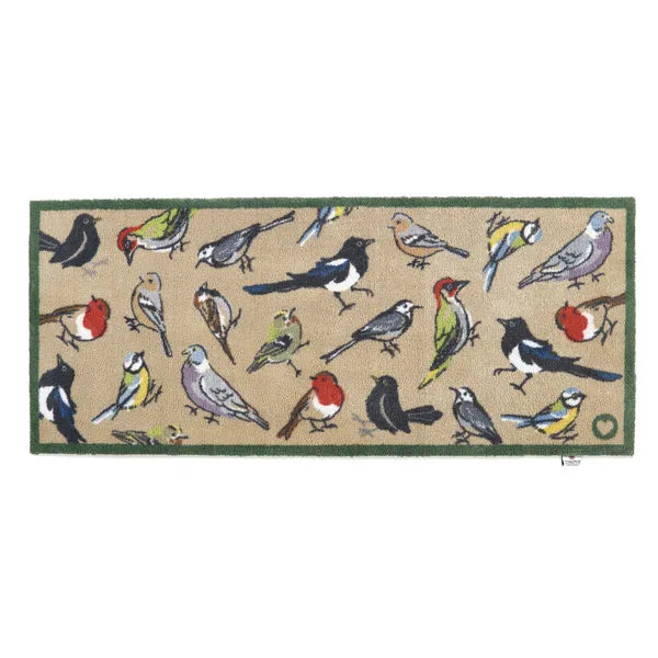 Hug Rug birdwatcher runner mat featuring colorful illustrated birds on a natural beige background with green border, 65cm x 150cm floor mat