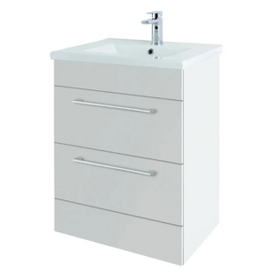 White wall-mounted bathroom vanity unit with ceramic sink and chrome tap, featuring two storage drawers with metal handles and clean modern design