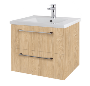Light oak wood wall hung bathroom vanity unit with two drawers, white ceramic sink basin and chrome single lever tap mixer on white background