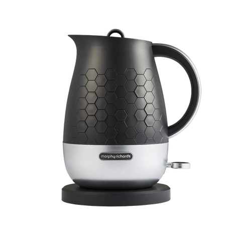 Morphy Richards Cassini 1.7 litre jug kettle in moonless night black with white base, featuring hexagonal pattern design on the body, stainless steel accents, black handle and cord, sitting on matching black base