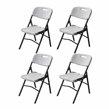 Four white blow moulded folding chairs with black metal frames arranged in a 2x2 grid, featuring carrying handles on the backrest and sturdy leg braces